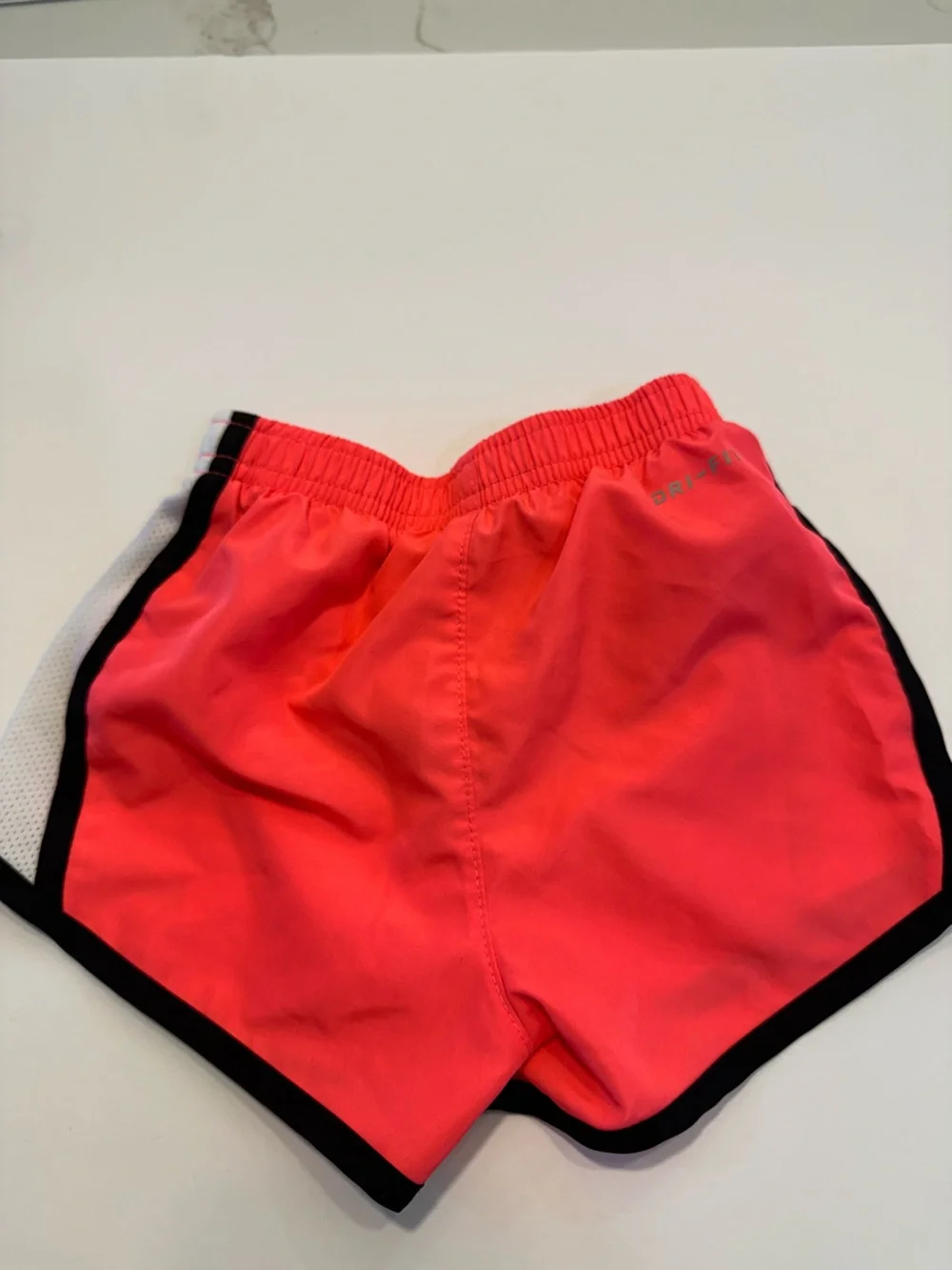Nike kid's Coral-Pink Athletic Shorts with Black & White Trim